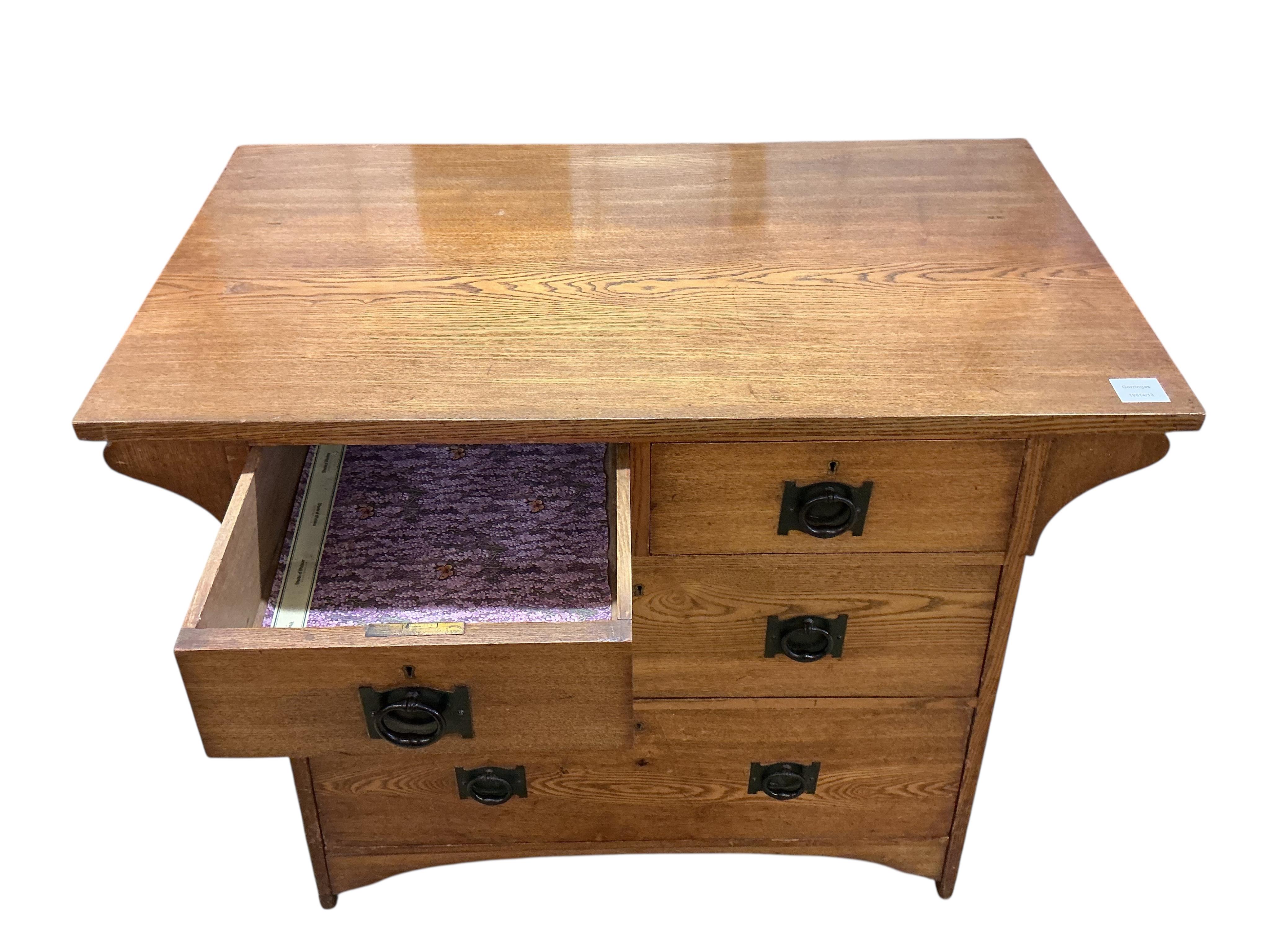 A Liberty style Arts & Crafts oak chest of four drawers, width 91cm, depth 52cm, height 84cm